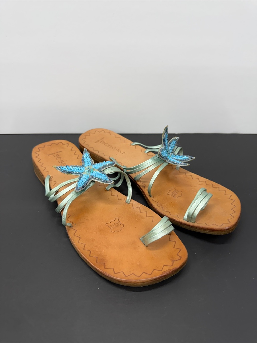 BCBGMaxAzria Mint Leather Slide Sandals with Blue Starfish Accent